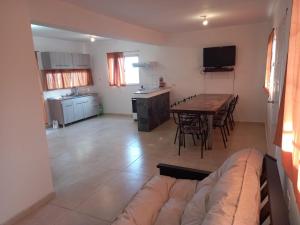a living room with a couch and a table at Solanas tanti in Tanti