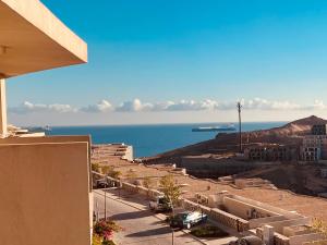 a view of the ocean from a building at المونت جلاله - ll Monte Galala Ain Sokhna in Ain Sokhna +48 photos