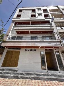 a building with a marriott sign on the side of it at Résidence Madior D1 in Dakar