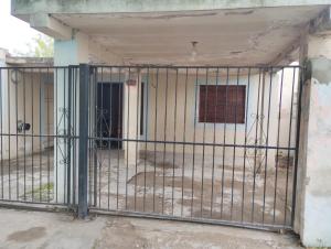 an iron gate in front of a building at Refugio Pampa - General Pico in General Pico
