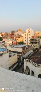 a view of a city from the roof of a building at Sakez Homestays HH in Hyderabad
