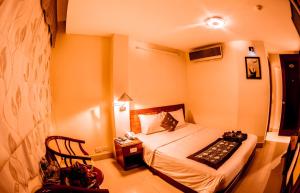 Cama o camas de una habitación en Pacific Hotel