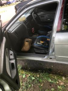 a car with its door open with its trunk at Swallow's nest in Kingston