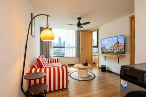 Amanda Hotel 堆谷里酒店 में टेलीविजन और/या मनोरंजन केंद्र