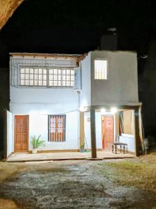 a model of a house at night at Departamento TERRA ANDRAY centro in Famatina