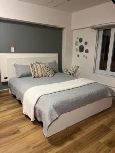 a bedroom with a large bed with pillows on it at iDesign Loft at Old San Juan in San Juan