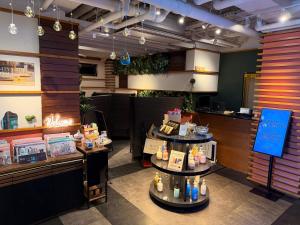 a restaurant with three tiers of food on display at ライオンズロック in Nerima