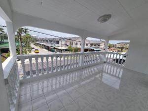 an empty balcony with a view of a street at D' Saras Homestay in Sitiawan
