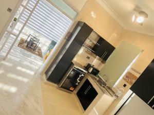 an overhead view of a kitchen with a counter top at His Goodness - Apt 2 in Katale