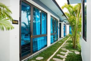 a view of the side of a villa with a swimming pool at New Sky Light Villa in Dong Hoi
