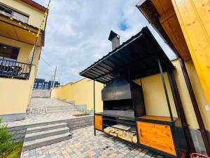 a large grill on the side of a building at Miracle View Dilijan in Dilijan