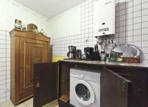 Kuchyňa alebo kuchynka v ubytovaní Willa Reglówka Stylowy dom Pachnący ogród