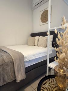 a bedroom with a bed with a ladder at NiceStay in Lugano