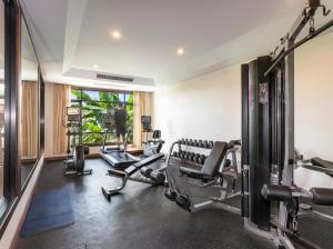 a gym with two treadmills and weights in a room at Katiliya Mountain Resort And Spa in Mae Salong Nai +103 photos
