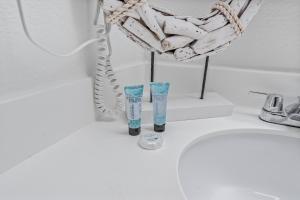 two vases sitting on a counter in a room at Beach View Condo in Myrtle Beach +22 photos