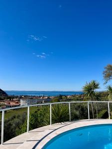 a view of the ocean from the balcony of a house at Casa Luca in Garda