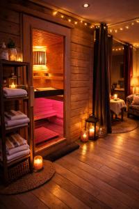 a room with a sauna with lights and candles at Hotel Saint Louis - Au Coeur des Remparts in Aigues-Mortes +81 photos
