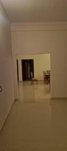a empty room with chairs and tables in it at Corbett Sun Shine in Rāmnagar