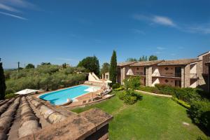 Bazén v ubytování Relais Il Canalicchio Country Resort & SPA nebo v jeho okolí