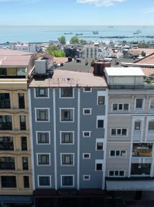 a view of a building with the ocean in the background at Diamond Beyazit Hotel in Istanbul
