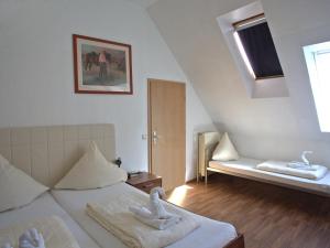 Ένα ή περισσότερα κρεβάτια σε δωμάτιο στο Hotel Zum Wersehof +96 φωτογραφίες