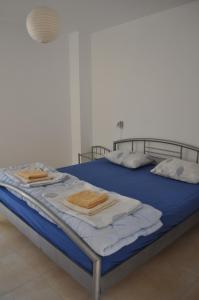 Villa Sun Village Byala tesisinde bir odada yatak veya yataklar