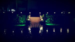 Ein Garten an der Unterkunft Riviera Taouyah Hotel