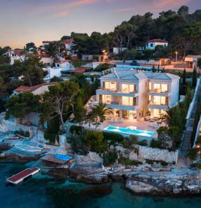 an aerial view of a villa with a resort at Villa Mila in Selca