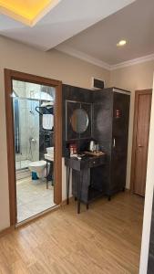 a bathroom with a sink and a toilet and a mirror at Taksim Nu Pera Hotel in Istanbul +41 photos