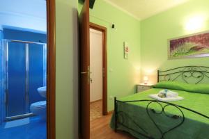 Postel nebo postele na pokoji v ubytování B&B La Villa