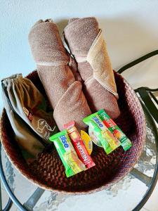a basket filled with food on top of a table at V Village Hotel Saraburi in Ban Muak Lek