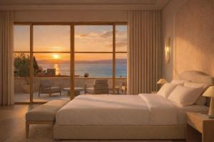 a bedroom with a bed and a view of the ocean at The Bristol Bol - NEW IN 2026 in Bol +62 photos