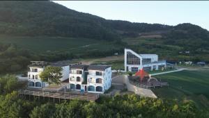 an aerial view of a building in a field at Danyang paramaeul in Danyang