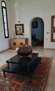 a large bowl on a table in a room at Villa maryama in Marrakesh