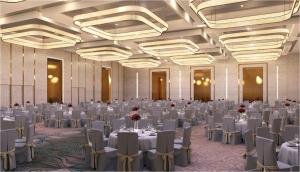a large banquet hall with white tables and chairs at Pullman Ninh Binh in Ninh Binh +122 photos