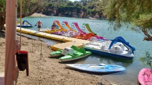 a group of inflatable boats on the water at a water park at Apartamento Martín in Ardales