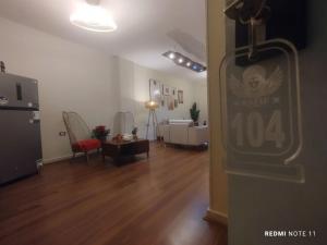 a room with a living room with a room at Rafifi pyramids inn view in Cairo