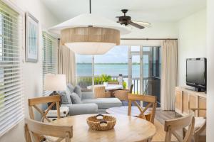 a living room with a view of the ocean at Villas at Hawks Cay Resort in Duck Key