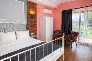 a bedroom with a bed and a large window at 216 North Hotel in Ağva +113 photos