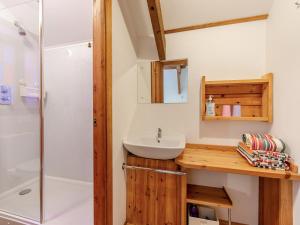 a bathroom with a sink and a shower at Hayloft - E3759 in Berrynarbor