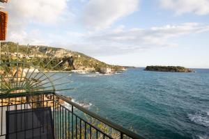a view of the ocean from a balcony at Gorgones, sea-front, great view in Kardamyli