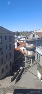 an overhead view of a city with buildings at Pension Casa Curro in Palas de Rei