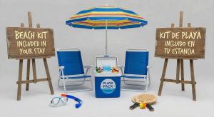a group of chairs and an umbrella and a trash can at Apartalux Benicassim Premium in Benicàssim