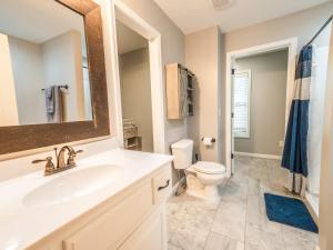 a bathroom with a sink and a toilet at Haven Hill House - Scenic Getaway near Bardstown & Bourbon Trail in Springfield +16 photos