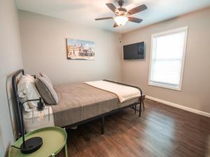 a bedroom with a bed and a ceiling fan at Haven Hill House - Scenic Getaway near Bardstown & Bourbon Trail in Springfield