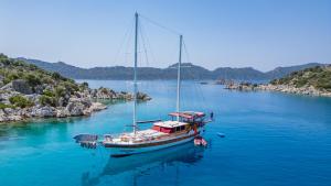 a boat is docked in a large body of water at Cakabey Yachting in Demre