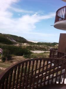 a view of the ocean from the balcony of a house at Paraíso chuí in Santa Vitória do Palmar
