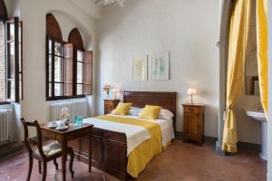 Postel nebo postele na pokoji v ubytování B&B San Gimignano Diffuso
