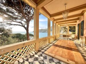 a view of the ocean from the porch of a house at VILLA NORMA in Levanto