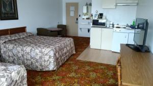 Kuchyň nebo kuchyňský kout v ubytování Travel Inn Hearst